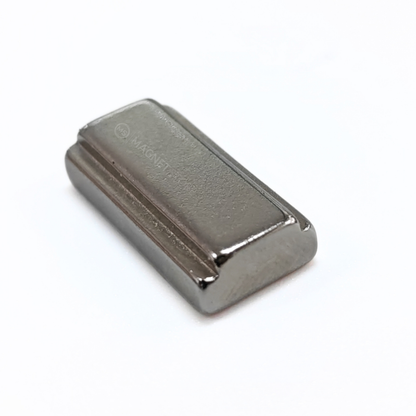 16/13 × 5/4 × 10 mm N42 Neodymium Step Block Magnet . Rectangular Nickel-coated neodymium magnet with a small step on the top sides.Sold at Magnet Store South Africa, Online and in store - Flat lay angle