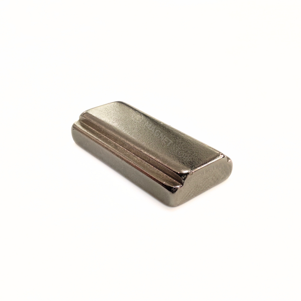 16/13 × 5/4 × 10 mm N42 Neodymium Step Block Magnet . Rectangular Nickel-coated neodymium magnet with a small step on the top sides.Sold at Magnet Store South Africa, Online and in-store - Flat Lay